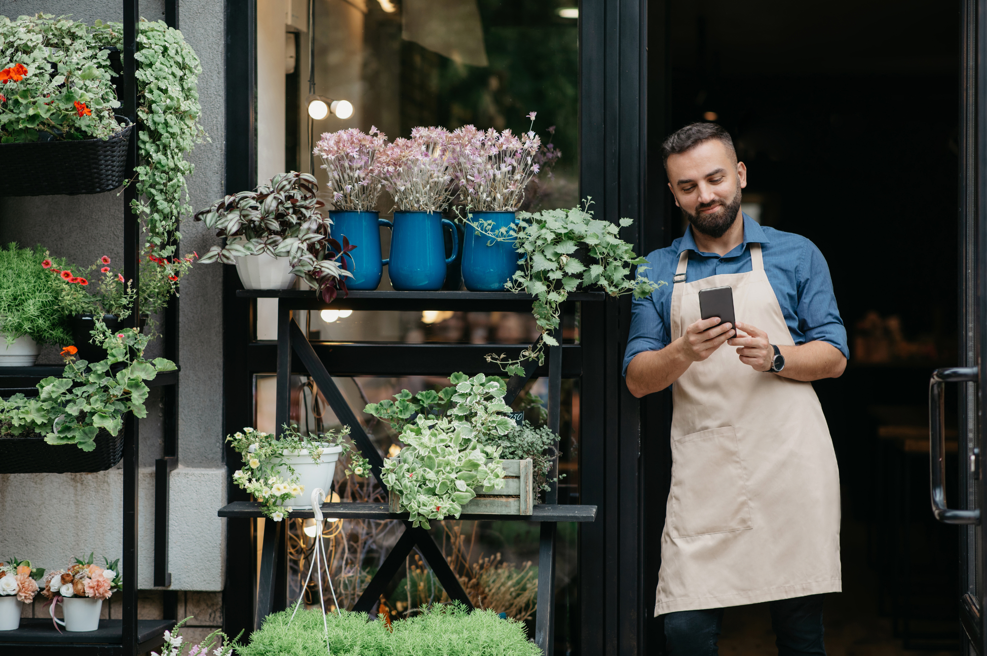flower shop owner standing outside, representing online lead response opportunities